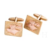 A pair of 14ct gold cufflinks with deer