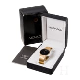 An 18-carat gold and quartz black dial Movado wristwatch with presentation box