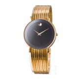 An 18-carat gold and quartz black dial Movado wristwatch with presentation box