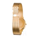 An 18-carat gold and quartz black dial Movado wristwatch with presentation box