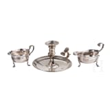 An English silver hand candlestick and two sauce boats, London, 18th century