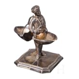 A figural silver salt cellar, German, Schw&auml;bisch Gem&uuml;nd, Gebr&uuml;der K&uuml;hn (founded 1860), circa 1900