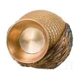 An unusual German silver-gilt and enamel owl-shaped lidded box, circa 1920