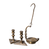Two barocque candlesticks and a miner's oil lamp, Spainish and german, 17th/18th century
