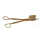 A Nuremberg brass candle snuff, 17th century