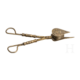 A Nuremberg brass candle snuff, 17th century