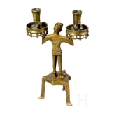 A figural brass candlestick in Nuremberg gothic style, ca. 1880