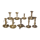 A group of nine brass candlesticks, 18th/19th century
