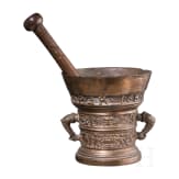 A bronze mortar, dated 1654