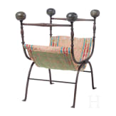 Faldstool, Italy, 17th century, in part 19th century, wrought iron, brass finials, textile seat