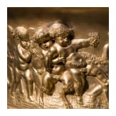A centerpiece with putti frieze, France, probably late 19th century, cast brass with gilt-coloured finish