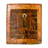 A Russian icon showing Saint Nicholas of Mozhaisk with 40 scenes of his life with silver halo, Russia, 18th century
