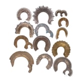 13 halos: 1 silver and cloisonn&eacute;-enamel, 3 silver, 9 brass, Russia, 19th/early 20th century