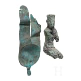 Bronze statuette of the seated god Amun and bronze insert of a crown with sun disc and double feather. Late period, middle third of the 1st millennium B.C.