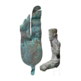 Bronze statuette of the seated god Amun and bronze insert of a crown with sun disc and double feather. Late period, middle third of the 1st millennium B.C.