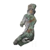 Bronze statuette of the seated god Amun and bronze insert of a crown with sun disc and double feather. Late period, middle third of the 1st millennium B.C.