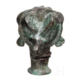 A bronze mace head with three ibex heads, Luristan, late 2nd millennium B.C.