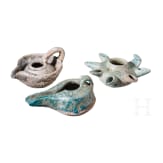 Three glazed Seljuk clay oil lamps, 12th &ndash; 13th century