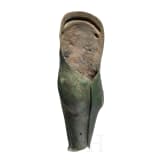 A Greek greave in bronze, anatomically formed, 5th century B.C.