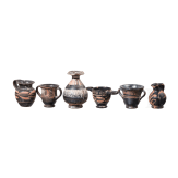 18 miniature vessels made of black glazed pottery, southern Italy, 4th &ndash; 3rd century B.C.