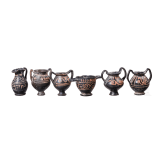 18 miniature vessels made of black glazed pottery, southern Italy, 4th &ndash; 3rd century B.C.