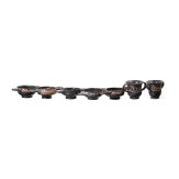18 miniature vessels made of black glazed pottery, southern Italy, 4th &ndash; 3rd century B.C.