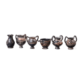 18 miniature vessels made of black glazed pottery, southern Italy, 4th &ndash; 3rd century B.C.