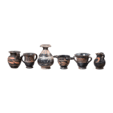 18 miniature vessels made of black glazed pottery, southern Italy, 4th &ndash; 3rd century B.C.