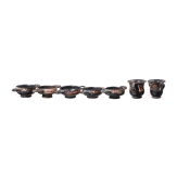 18 miniature vessels made of black glazed pottery, southern Italy, 4th &ndash; 3rd century B.C.