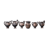 18 miniature vessels made of black glazed pottery, southern Italy, 4th &ndash; 3rd century B.C.