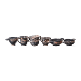 18 miniature vessels made of black glazed pottery, southern Italy, 4th &ndash; 3rd century B.C.
