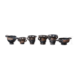 18 miniature vessels made of black glazed pottery, southern Italy, 4th &ndash; 3rd century B.C.