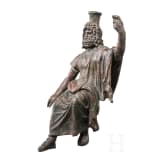 An enthroned Roman bronze statuette of Serapis, 2nd - 3rd century