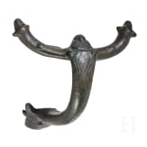 A Roman bronze handle attachment of a jug, 2nd - 3rd century