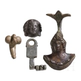 Two provincial Roman appliqu&eacute;s, a phallic pendant, and a key, 2nd to 3rd century