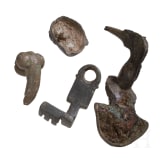 Two provincial Roman appliqu&eacute;s, a phallic pendant, and a key, 2nd to 3rd century
