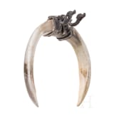 A late Roman silver pendant with two dolphins, circa 400 A.D.