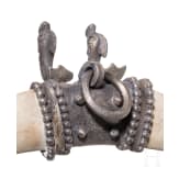 A late Roman silver pendant with two dolphins, circa 400 A.D.