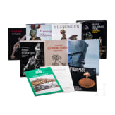 A large collection of books on armour and ancient weapons