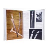 A collection of books on the subject of edged weapons and armour