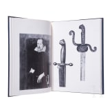 A collection of books on the subject of edged weapons and armour