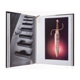 A collection of books on the subject of edged weapons and armour