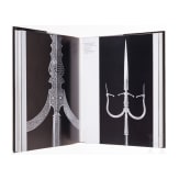 A collection of books on the subject of edged weapons and armour
