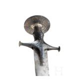 An Indian tulwar with silver damascened hilt, ca. 1800