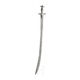 An Indian Tulwar with silver damscened hit and damascus blade, ca. 1800
