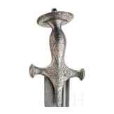 An Indian Tulwar with silver damscened hit and damascus blade, ca. 1800