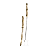 A Japanese wakizashi in carved bone mounts, Meiji-Period