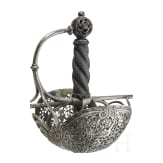 An Italian cup-hilted rapier with openwork guard, mid 17th century