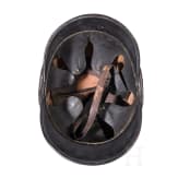 Four headgear items, 20th century