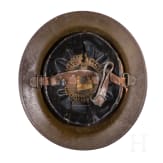 A steel helmet M 17 "Brodie" of a veteran from the 2nd Infantry Division "Indianhead"